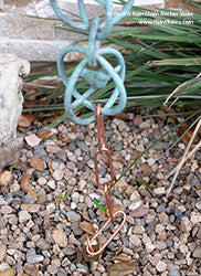 Rain chain anchor stake RCAS-003 installed in ground