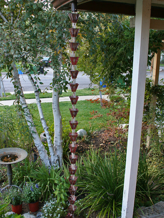 Slotted square copper rain chain architectural cup design for tropical homes