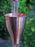 Smooth copper cup rain chain for heavy tropical rainfall in Hawaii